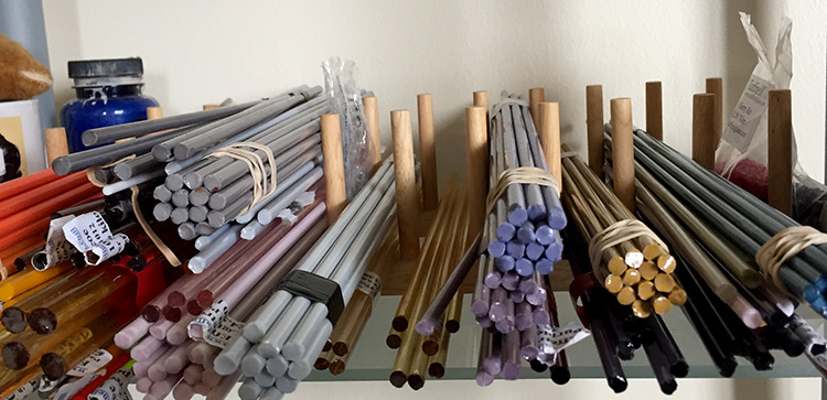 Lampwork glass rods in a pile