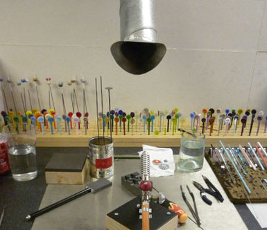 Lampwork Working Area showing torch, glass, tools and ventilation